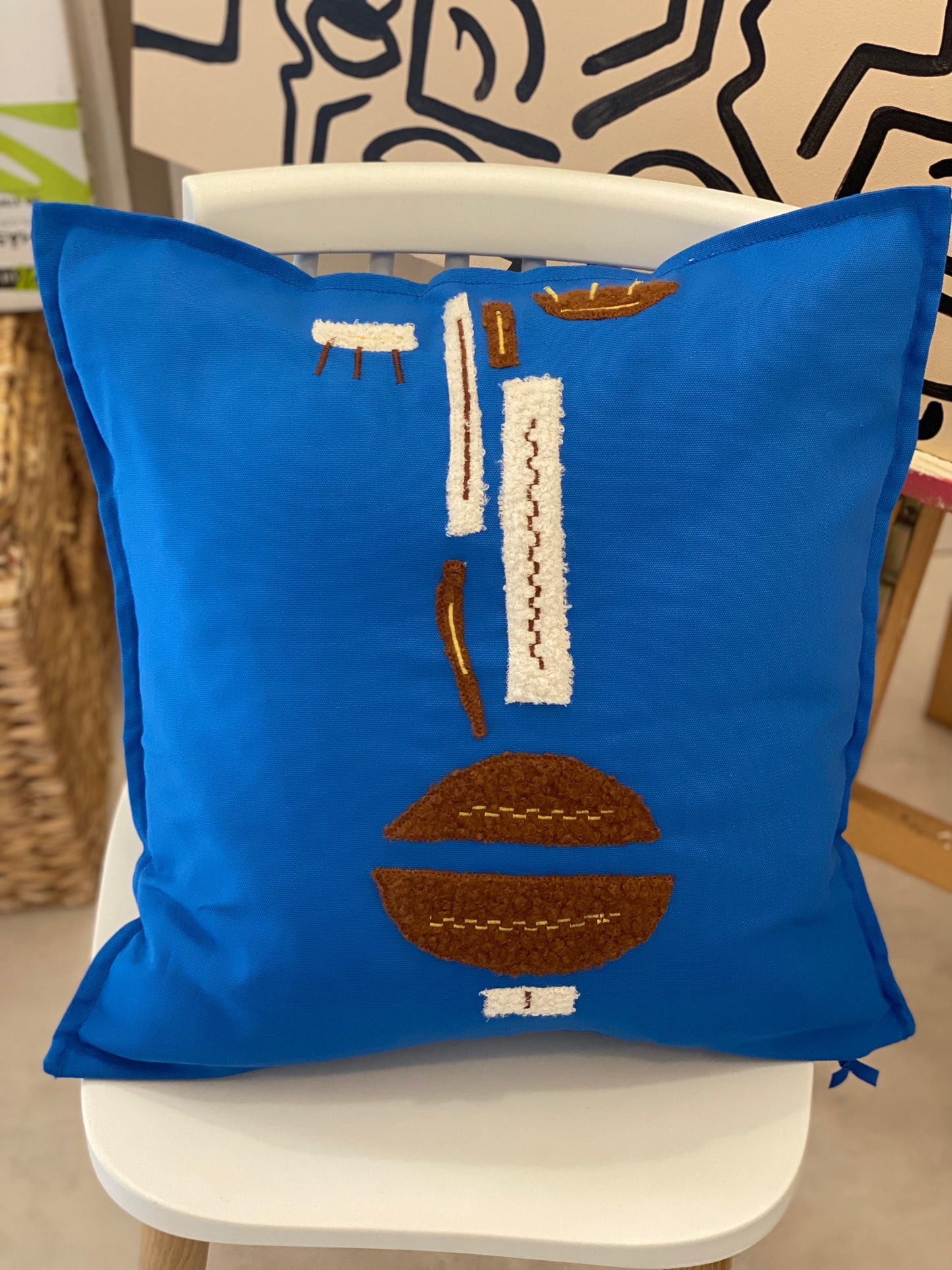 Coussin deco bleu détail marron/beige